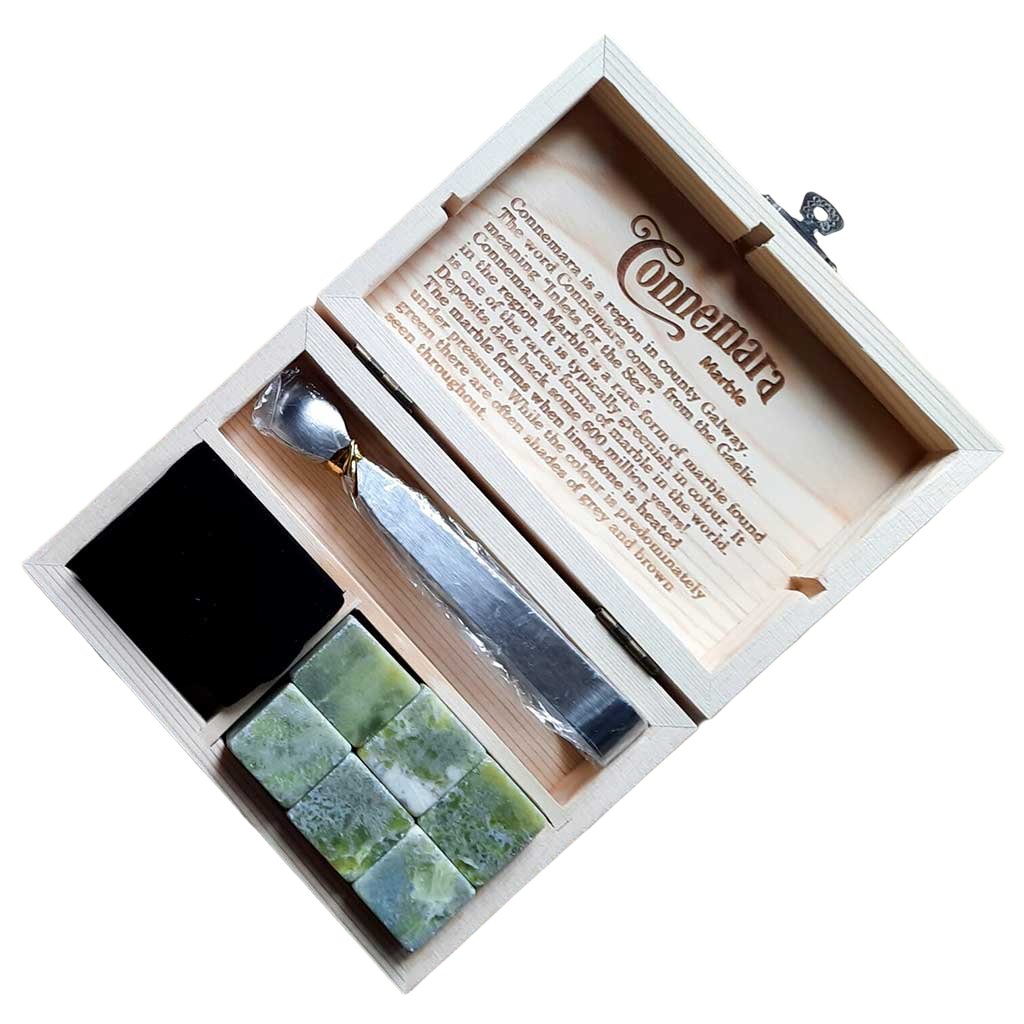 6 Hand Polished Connemara Marble whiskey stones in a wooden box with a serving tongs and a velvet b
