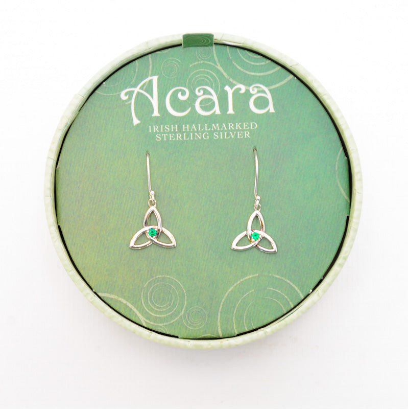Silver hanging earrings with Trinity knots at the end, with green glass gem in the center of the knot