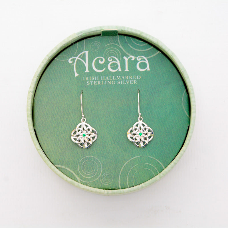 Silver hanging Celtic knot earrings, with green glass gem in the middle